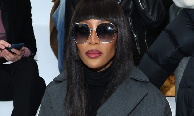 Naomi Campbell Strikes a Pose in Quilted Jacket and Black Ankle Boots – Footwear News
